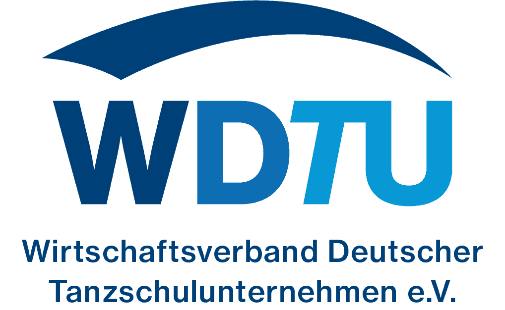 Logo des WDTU mit einem blauen Bogen über dem Akronym und dem vollständigen Namen 